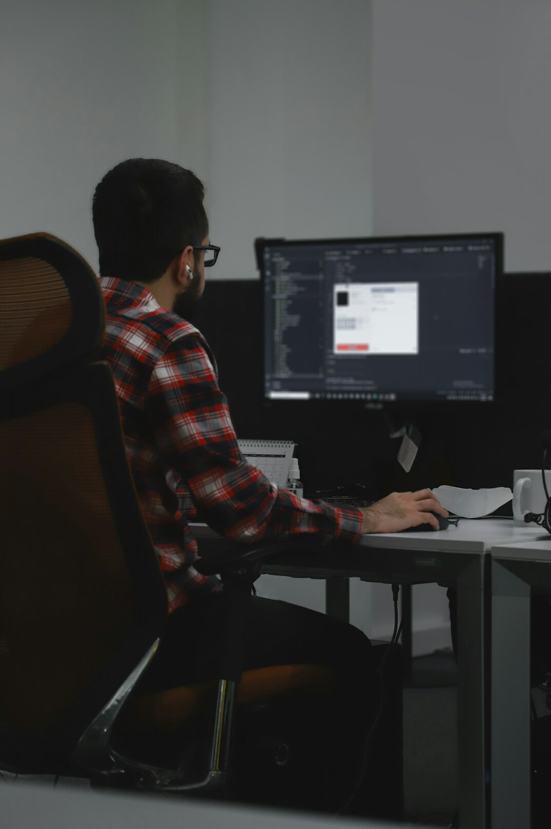 developer coding at desk